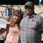 Bruce Watts and Sue Briggs, Miss Wyoming, with her vacation copy of the Town Crier.      Photo by J.P. Crumrine