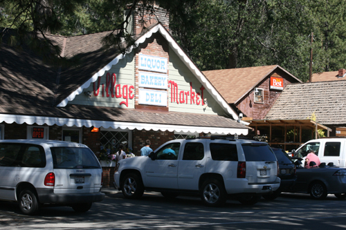 Village Market will retain but move historic sign