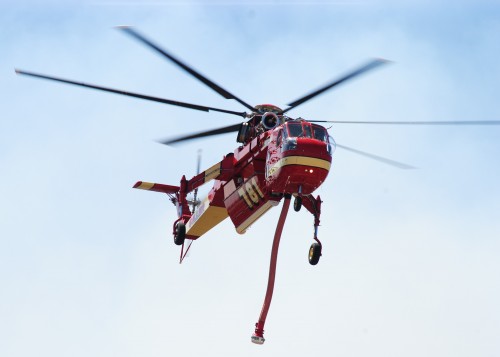 One of the numerous helicopters helping fight the Summit Fire Wednesday afternoon.