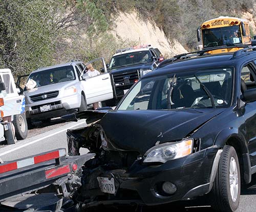 A two-vehicle traffic collision with minor injuries just north of Saunders Meadow Road on Highway 243 created one-lane traffic Monday afternoon. Gabriel Michelle Roberts, 52, of Hemet, was traveling northbound in a Subaru Outback, according to CHP Officer Ron Esparza, when she veered into the southbound lane. Michael Curtis Loften, 18, of Mountain Center, was traveling southbound in a Pontiac Grand Prix and he swerved into Roberts’ lane to avoid a collision. She then swerved back into her lane where the vehicles collided. Both drivers refused treatment for their injuries.		Photo by Jay Pentrack