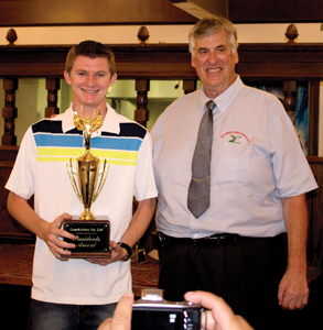 Above: Garrett Moyer received the President’s Award from Grandfathers for Golf President Tony Viola at the organization’s annual awards ceremony held Friday, Oct. 25, at the Golden Era Golf Course.  Photos by Jim Crandall