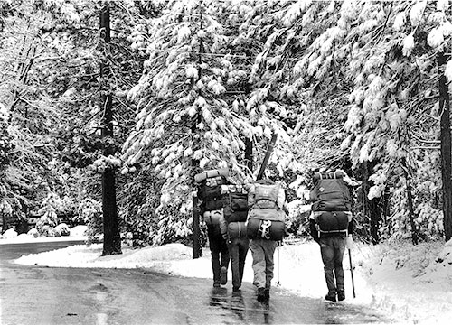 Depite the threat of further storms, backpackers trudged their way to Humber Park and the wilderness area in November 1973. Most had a safe and glorious back-country experience, though two late-departing hikers from Lake Hemet spent a stormy Sunday night in the South Fork and were helicopter-rescued after daybreak. File photo, by Norwood Hazard