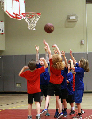 The Barracudas and the Red Ninjas took to the net Monday night, Feb. 10, during youth coed basketball at the Idyllwild School gym.  Photo by Jenny Kirchner