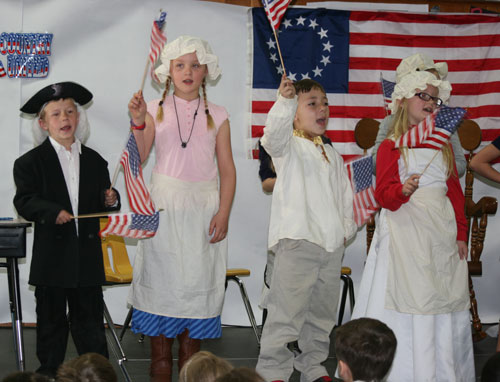 A patriotic play was staged at Idyllwild School last Friday. The children told the story of Betsy Ross and sang patriotic favorites such as, “You’re a Grand Old Flag” and “This Land is Your Land,” to a packed auditorium.         Photo by Jay Pentrack