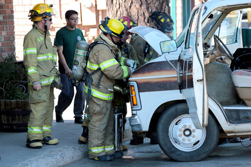  About 2 p.m. Sunday, Idyllwild Fire responded to a report of a vehicle fire in front of Mountain Top Liquor. Several locals had already put out the fire when emergency crews arrived. But the crew ensured the fire was fully extinguished. Photo by Jenny Kirchner