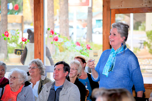 Last Thursday night at Oma’s European Restaurant and Bakery, Erin O’Neill (standing) discussed and illustrated her underwater adventure in the Philippines last year prior to the typhoon. She was the featured speaker at last week’s Soroptimists of Idyllwild meeting. Photo by Gina Genis