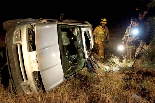 Wyatt Russell Ewing, 29, of Vista, was arrested on suspicion of driving under the influence early Sunday morning, March 16, according to California Highway Patrol Officer Ron Esparza (right). Ewing was traveling west on Apela Drive on the Idyllwild Arts campus around 1 a.m. when he lost control, flipping his silver Saturn VUE, crashing through a fence and rolling down an embankment into a field. Idyllwild Fire transported Ewing to Desert Regional Medical Center for treatment. Photo by Jenny Kirchner