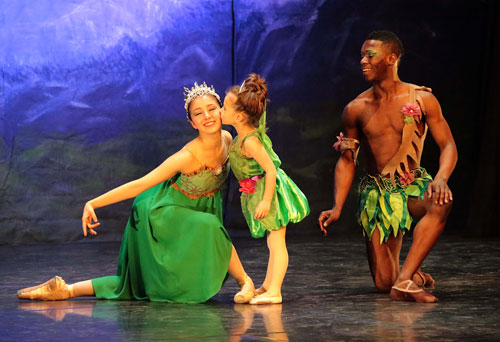 Lucy Newman (center) kisses Clara Stark, playing Titania, during the second half of the Idyllwild Arts Academy’s Spring Dance Concert, “A Midsummer Night’s Dream,” last weekend. Cemiyon Barber, performing the role of Oberon, King of the Fairies, looks on. Photo by Jenny Kirchner