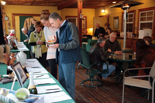 The Associates of Idyllwild Arts held its Squirrelly Auction in the Pines on Saturday afternoon at the Rainbow Inn. Both a silent and live auction helped raise money for Idyllwild Arts Academy. Hors d’oeuvres and beverages were served to refresh the ardent bidders. Photo by Jenny Kirchner