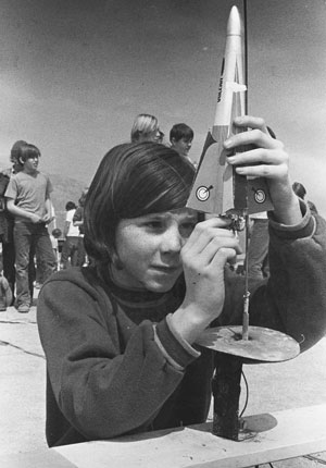 Idyllwild School Rocket Club members tested their equipment under the guidance of Jerry Coulter in March 1973. Interested members of the fifth through seventh grades formed the club to experiment with rockets, some building from kits and others from their own design. Most were amazed at their success and the height to which they soared. Shown are Ted Weverka, 19, and Kirby and Tim Moore, both 13, preparing their rockets for launching.    Photo by Jerry Coulter, file photo