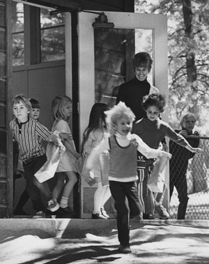 Bursting out of the kindergarten room at Idyllwild Elementary School in March 1972, these little citizens were headed for an Easter egg hunt with bags in hand.  Photo by Gary Squier, file photo 