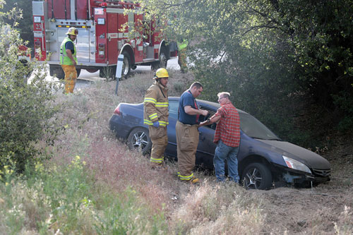 According to California Highway Patrol Officer Mike Murawski, at about 5:40 p.m. Monday, May 19, Rob Rutherford, 56 of Idyllwild, was traveling south on Highway 243 when he lost control of his 2007 Blue Honda Accord near mile marker 15, about 1.5 miles north of Lake Fulmor. The car careened off the road and down an embankment. Rutherford was uninjured, but was arrested by CHP Officer Murawski on suspicion of driving under the influence.   Photo by Jenny Kirchner