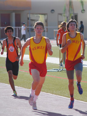 Tanner Torrez (right) and Chad Schelly (left) finished first and second, respectively, in the 800-meter race during Thursday’s track meet between Hemet and San Jacinto high schools. Hemet’s boys’ and girls’ teams both won.  Photo by J P Crumrine