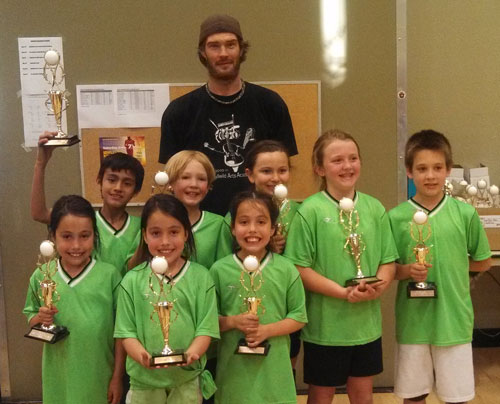 First-place winners in Division A in Town Hall Kids Volleyball last week were the Green Dragons. Back row is Coach Jeremy Teegarden; middle row, from left, Fernando Maldonado, Layton Teegarden, Serena Rodriguez, Lauren Johnson and Adein McLean; bottom row, from left, Lorelei Nowell, Josslyn Nowell and Calista Nowell. (Not shown was Tara Geisinger.)   Photo by Ginger Dagnall