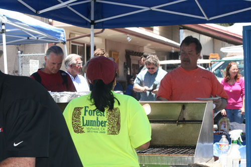 FREE LUNCH: Forest Lumber hosted its annual Customer Appreciation Barbecue midday Thursday, offering free lunch.       Photo by Jay Pentrack 