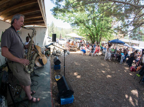 Saxophonist Paul Carman performs at the Scott Foster Memorial held at Jo’An’s on Sunday. A line-up of local talent paid tribute to Foster, who died in May from a fast-growing cancer. The event raised funds for Foster’s family — fiancée Annie and 8-month-old son Zion. Photo by John Pacheco