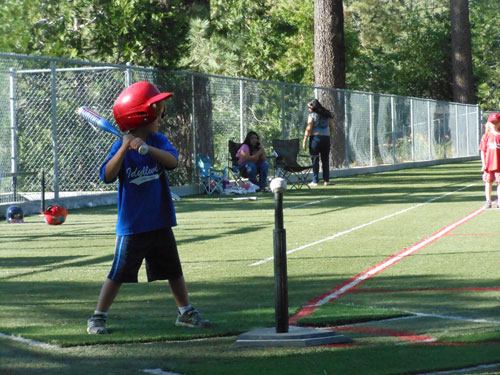 Griffin Kretsinger is ready to put the ball in play Monday night when the Dodgers played the Angels in Town Hall T-ball.   Photo by Teresa Garcia-lande