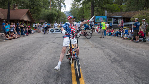 Bud Hunt leads the Idyllwild Cyclists contingency in the annual Fourth of July Parade.  Photo by John Pacheco