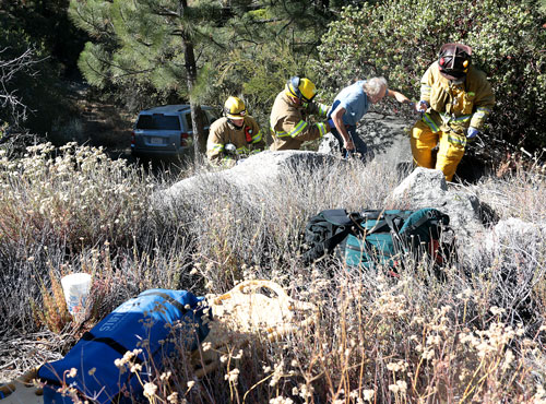 A call came into emergency personnel about 8 a.m. Tuesday morning, July 15, after Dennis Okeefe, 63, of Idyllwild was traveling southbound on Highway 243 near mile marker 1.75 when he fell asleep at the wheel, careening about 50 feet off the highway. Okeefe was uninjured and walked up with the help of fire personnel. CHP Officer Chris Blondon, Idyllwild Fire, Riverside County Fire, Idyllwild Garage and U.S. Forest Service all responded to the incident.    Photo by Jenny Kirchner 