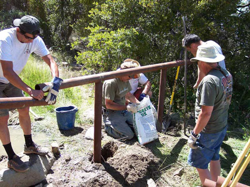 Scouts West 4x4 Club volunteers blocking an unauthorized road leading into the Santa Rosa Wilderness.          Photo courtesy U.S. Forest Service 