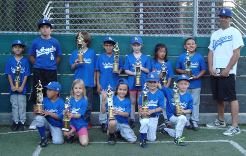 The Dodgers are the 2014 Youth Co-ed baseball minors champions. The Dodgers defeated the Braves 10-5. “It was amazing!  A pretty competitive game,” said Shannon Johnston. Photo by Shannon Johnston