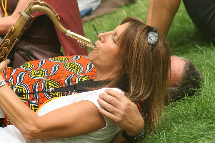 When Deanna Bogart saw Vic Sirkin of Idyllwild (and a jazz fest volunteer) relaxing on the grass in the front row during her performance, she literally got “down and dirty,” bringing her lively entertainment directly to him and then throughout the audience during the 21st Jazz in the Pines at Idyllwild Arts last Sunday. Photo by Jack Clark