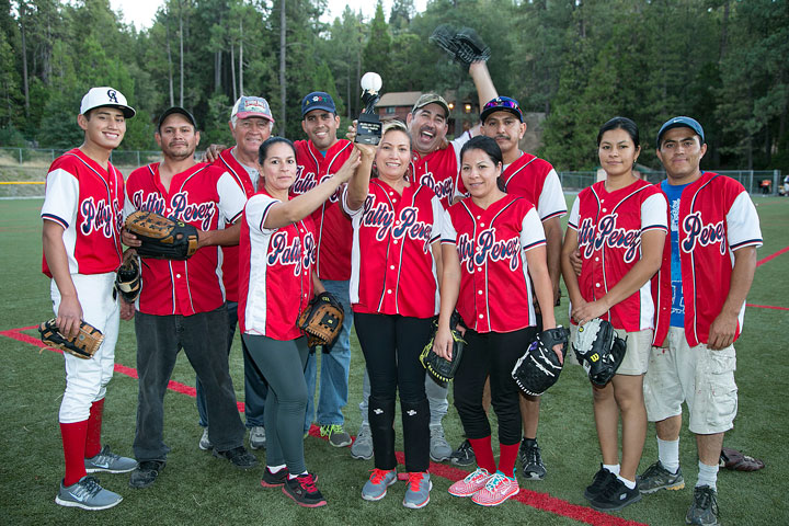 Above, the Town Hall Adult Division 2 Championship winning team is Patty Perez Cleaners. Members of the team in the front row (from left) are Sonia, Patty, Lupita and Candy Perez. Standing in the back (from left) are Kadem and Jose Perez, Mike Murray, Edgar, Aurelio, Rene and Hector Perez. Photo by Jenny Kirchner 