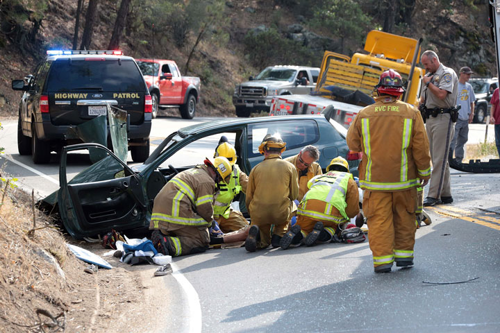 According to CHP Officer Mike Murawski, two males suffered major injuries after losing control of their Honda Civic while traveling at a high speed eastbound on Highway 74 near McCall Park Road Monday around 4:30 p.m. The Honda crossed the double-yellow line, colliding with a Penske truck traveling westbound. Idyllwild Fire transported both men in the Honda to Keenwild Forest Service station where they were transported by Mercy Air to nearby hospitals. The truck driver was uninjured. Idyllwild Fire Chief Patrick Reitz said one man was seriously injured and the other critically.          Photo by Jenny Kirchner