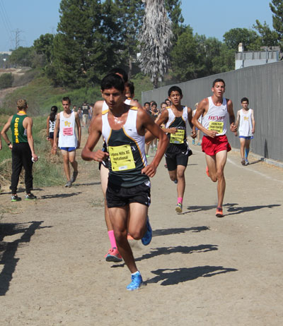 Leading the Hemet senior team is Idyllwilder Jayden Emerson (far right, in center photo), who ran the race in 15:52 to finish second out of 130 runners. Photo by Jessica Priefer