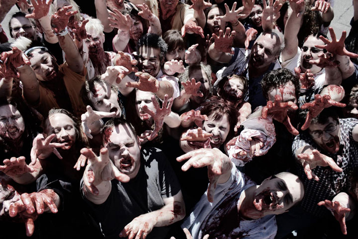 Prior to the October 2013 Zombie Run, a horde of zombies collected near Ghost Town.    	           Photo by Robert Sabin 