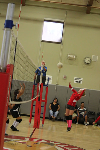 Nicole Cochrane (on right) of Idyllwild School’s girls volleyball team returns a serve from the Noli team Wednesday. Idyllwild won the match in three games.  Photo by Jessica Priefer