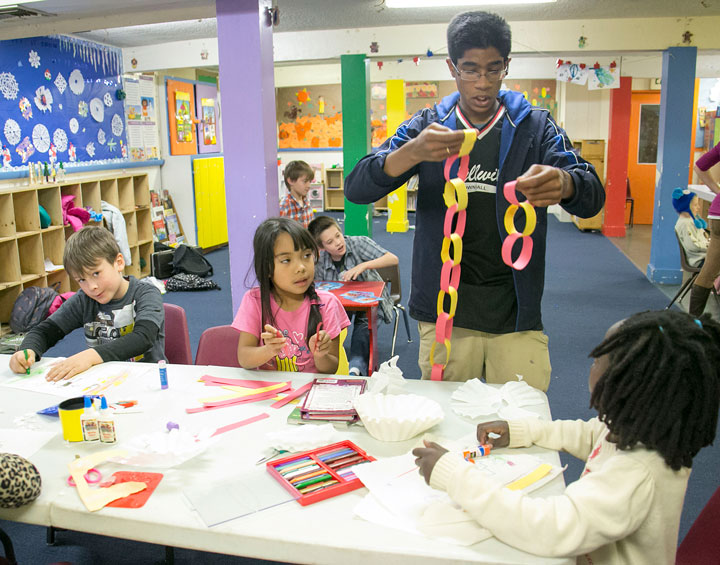 Prasad Peebles, 14, helps make holiday decorations Friday at Town Hall during an arts day event. Photo by Jenny Kirchner 