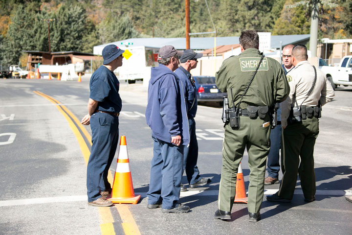 DISPOSAL SCARE: On Saturday, Riverside County Sheriff’s Department, California Highway Patrol and Idyllwild Fire Department closed Maranatha Drive after a smoke grenade was left at a household hazard waste collection event sponsored by Clean Harbors Environmental Services. The area was evacuated from about 10:30 a.m. until noon while the Sheriff’s Department confirmed the device was non-threatening and they could safely dispose of the grenade.         Photo by Jenny Kirchner