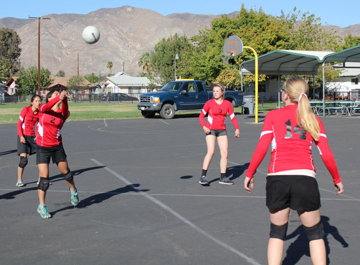 Sydney Cruz of Idyllwild Middle School, returns a serve during last week’s game against Saint Hyacinth Academy in San Jacinto.   Photo by Jessica Priefer