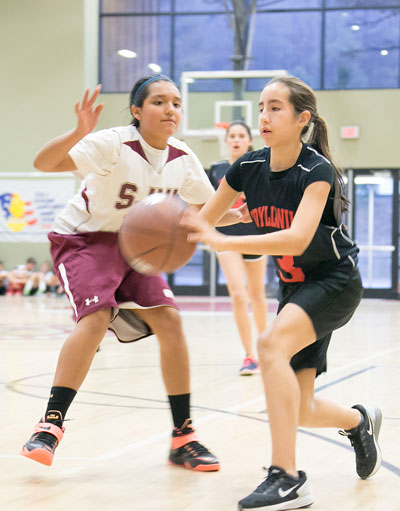 Payton Priefer, of the Idyllwild Middle School girls basketball team, heads up the court against San Jacinto Wednesday.  Photo by Jenny Kirchner.