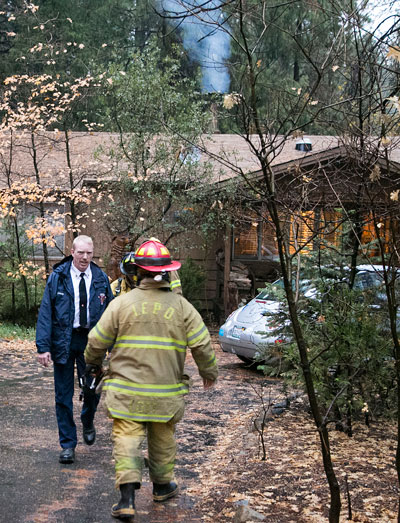 CHIMNEY FIRE: A chimney fire broke out on Strawberry Valley Drive Tuesday afternoon despite the inclement weather. Idyllwild Fire quickly responded and controlled the fire.  Photos by Jenny Kirchner