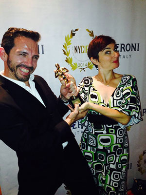 Mel England and Janice Markham are the stars, writers and producers of “Ron and Laura Take Back America.” Here they celebrate their win for Best Comedy at the 2014 New York City International Film Festival. Photo courtesy of Janice Markham