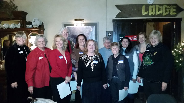 Soroptimist International of Idyllwild’s Christmas party and new member induction was held Thursday, Dec. 11, at Silver Pines Lodge. Shown, from left, are District 2 Membership Chair Lori Oliver, President Karen Doshier, new members Tori Thomas, Carol Mendoza, Leandra George, Patricia Hayes, Roberta Melendez-Callahan, Lola Fisher, Shelly Adleta-McKay, Theresa DuBois Teel, and former Soroptimist International Governor of Golden West Region Fran Ballard.     Photo by Mary Morse