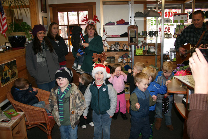 Kathy Lewis’ Forest Friends Day Care kids stopped by the Town Crier offices on Thursday, Dec. 18 to sing Christmas Carols for the staff.  For everyone at the Town Crier, the children make the Holiday Season even more enjoyable.   Photo by Jay Pentrack 