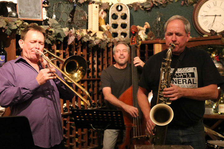 Forbits held an album release party last Saturday at Idyll Awhile Wine Shoppe Bistro. Shown are three of the four members, (from left) Joey Sellers, trombone, Chris Symer, bass, and Paul Carman, saxophones. Not shown is drummer Kendall Kay. Photo by Cheryl Basye 
