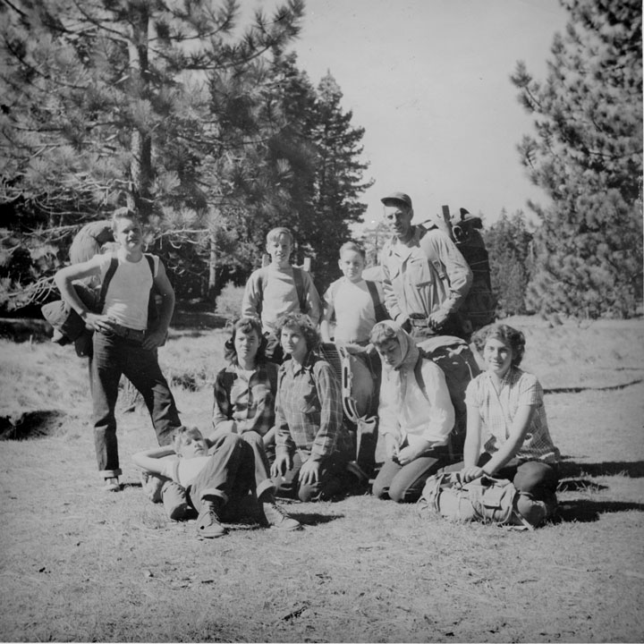 An Idyllwild youth group in Skunk Cabbage Meadow about 1955. From left, Dale Bischof and Doug Dement (lying down); seated, Pattie Davies, Gladys Turner, Carol Michelsen and Susie Shinn; standing, Pat Boss, Don Morlan and Ernest Maxwell. Photo by Ronnie Wilson 