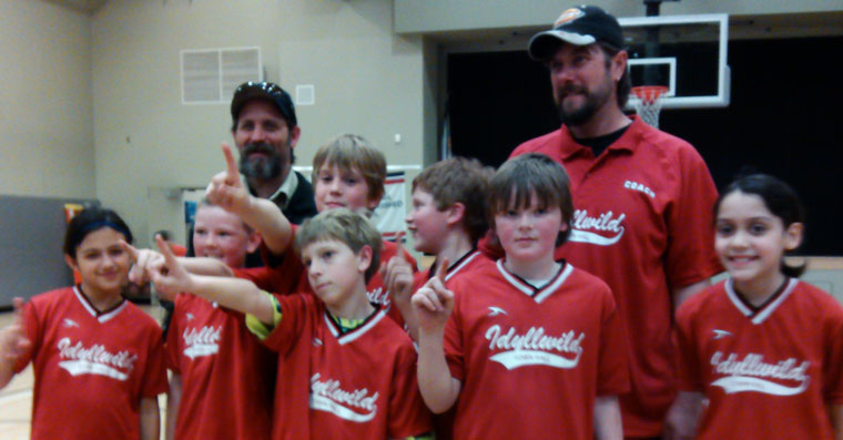 Jo’An’s Heat (right) are the champs of the 9- to 11-year-old Division in Town Hall Youth Basketball. Members of the team (from left) are Hannah Lady, Ethan Teeguarden, Preston Pino, Nick Fletcher, Rene Hernandez, Cody Fogle and Ellie Reyes with coaches Chris and Lance Fogle. Not shown is Layton Teeguarden. Photos courtesy Town Hall