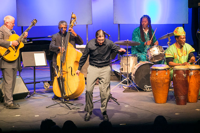 Justin Holmes (center) adds tap dancing into the mix during the “History of the Drum” event Thursday at Idyllwild Arts. Musicians providing rhythm for Holmes are (from left) Bob Boss on guitar, Marshall Hawkins on bass, Toby Williams on drums and Najite on African drums. Photo by Jenny Kirchner