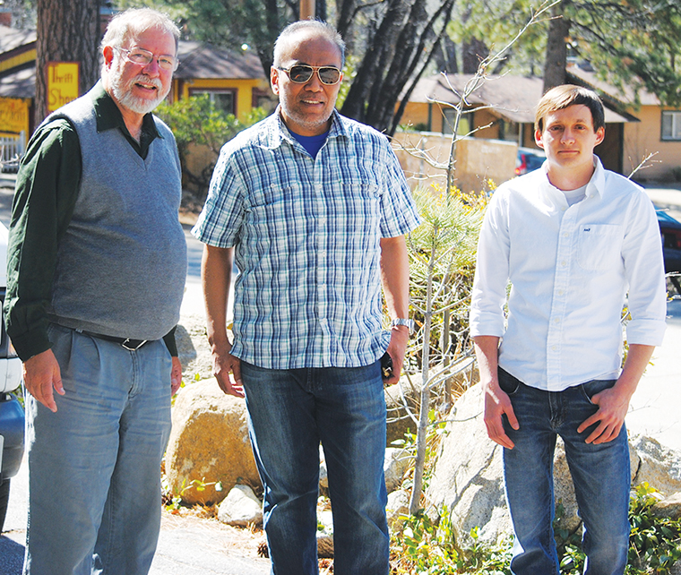 The National Weather Service officials met with Town Crier owner and co-publisher Jack Clark (left) about establishing a NWS weather recording station in Idyllwild at the paper Tuesday morning. Noel Isla (center), observing program leader, discussed the requirements and equipment and was accompanied by Brett Albright (right). Photo by J.P. Crumrine