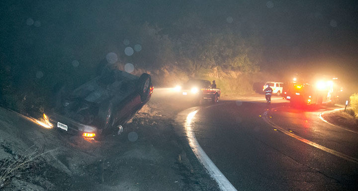 Thick fog and drizzle covered the mountain late Thursday night, April 23, causing visibility to be minimal. At about 10:30 p.m., a solo-vehicle traffic collision occurred on Highway 243 near Saunders Meadow Road. Idyllwild resident Clare Buesch lost control of her green Toyota Rav 4 L, overturning just off the pavement. Idyllwild Fire Department transported the driver to a nearby hospital with unknown injuries. California Highway Patrol reported the cause was driving too fast for current road conditions Photo by Jenny Kirchner
