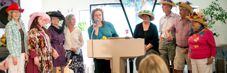 The Spiritual Living Center held a bonnet contest on Easter Sunday. The three categories were most beautiful, funniest and most creative. Charmane Mitchell’s bonnet was chosen the funniest (fourth from left, in the white shirt), Phyllis Brown (second from left) wore the most beautiful bonnet and Dottie Goldfarb (far right) wore the most creative. Photo by Jenny Kirchner