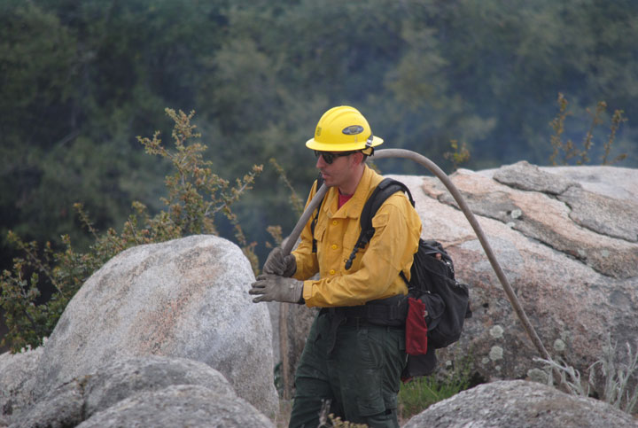 On Thursday, April 23, the U.S. Forest Service conducted pile burning along the West Ridge Fuelbreak. With the light rain that day and more forecast for the weekend, the Forest Service took advantage of favorable weather conditions to do some burning near houses. Photo by J.P. Crumrine 