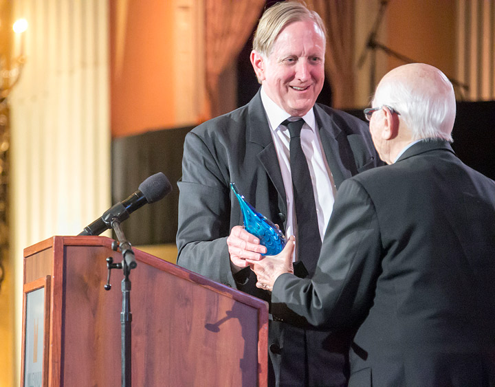 Idyllwild Arts gala Joseph Henry “T Bone” Burnett (left), American musician, songwriter, and soundtrack and record producer, receives the Life in Art Award by legendary television writer and producer Norman Lear during the annual Idyllwild Arts Academy Gala Sunday night at the Millennium Biltmore Hotel in Los Angeles. Photo by Jenny Kirchner 