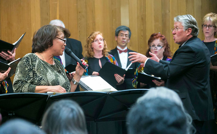 Sherry Williams (left), Conductor Dwight “Buzz” Holmes (right) and the Idyllwild Master Chorale perform “Sigh No More Ladies” by John Dankworth last Saturday night at Stephens Hall on the Idyllwild Arts campus. Photo by Jenny Kirchner