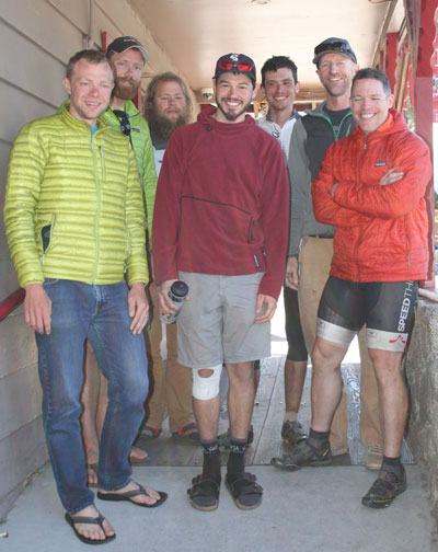 Seven Stagecoach 400 mountain bike riders breakfasting at Red Kettle to recharge after the 400-mile event. From left, Eric Lord, 6th place; Ben De Witt, 4th; Tristan Borgenson, scratch; Neil Beltchenko, 1st; Daniel Jesse, 13th; Blake Bockius, 8th; and Michael Grosso, 14th. Seventy-two registered for the March 27 start, and 20 dropped out the first day of the grueling ride. Photo by Marshall Smith